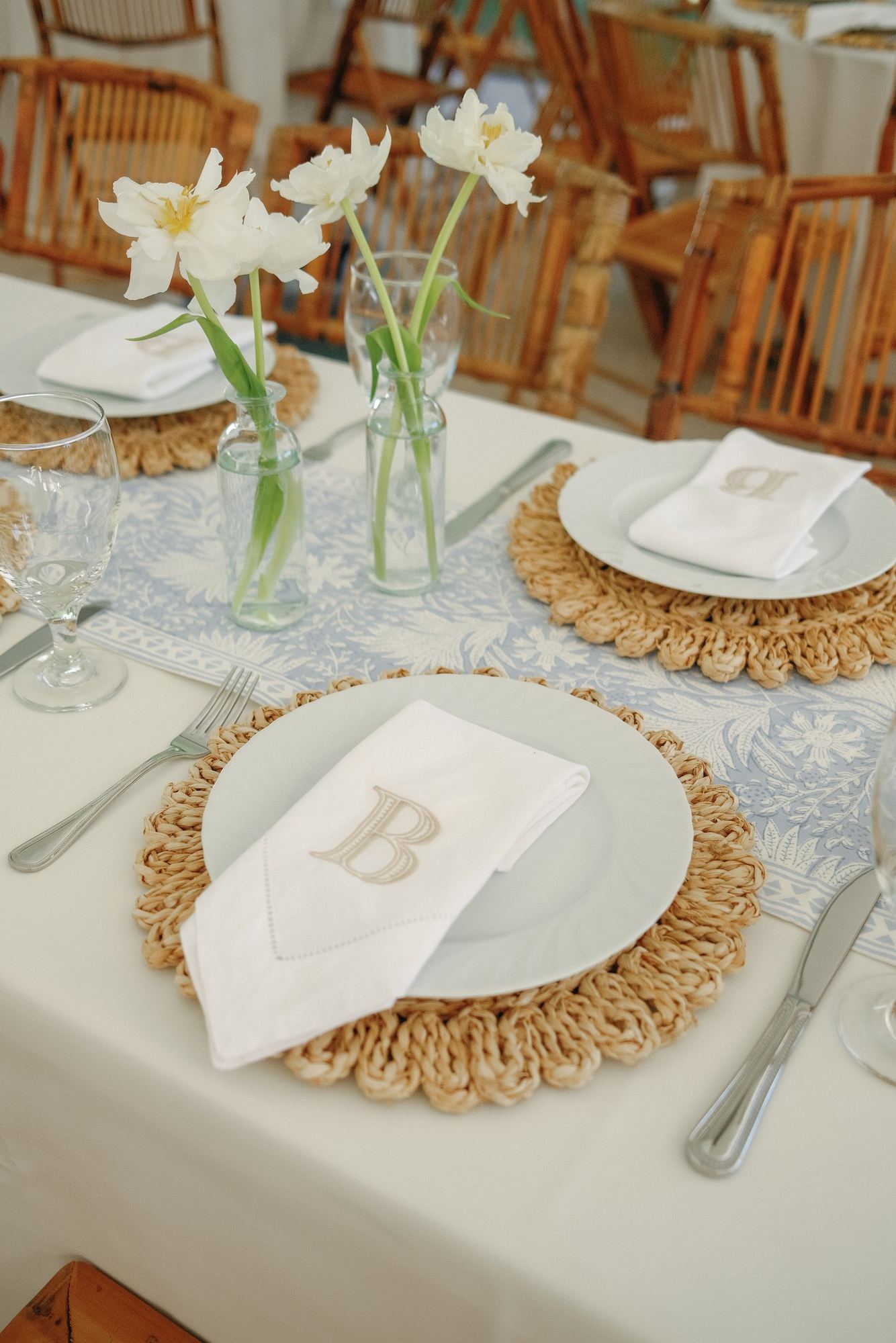 Charleston place setting with a Nila Blue printed runner and monogrammed napkin